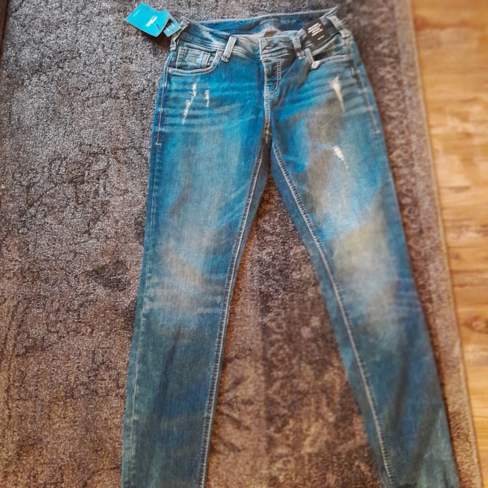 Silver distressed jeans size 27/4